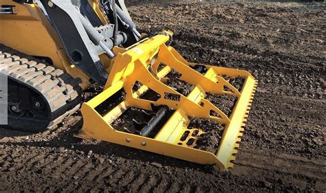 skid steer loader land leveler|leveling ground with a bobcat.